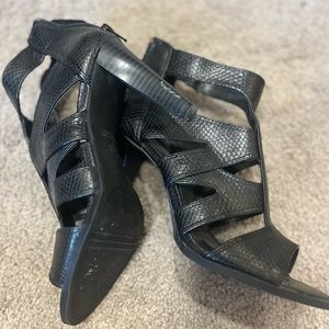Size 7.5 Vera Wang snakeskin black heels! Only worn a few times.